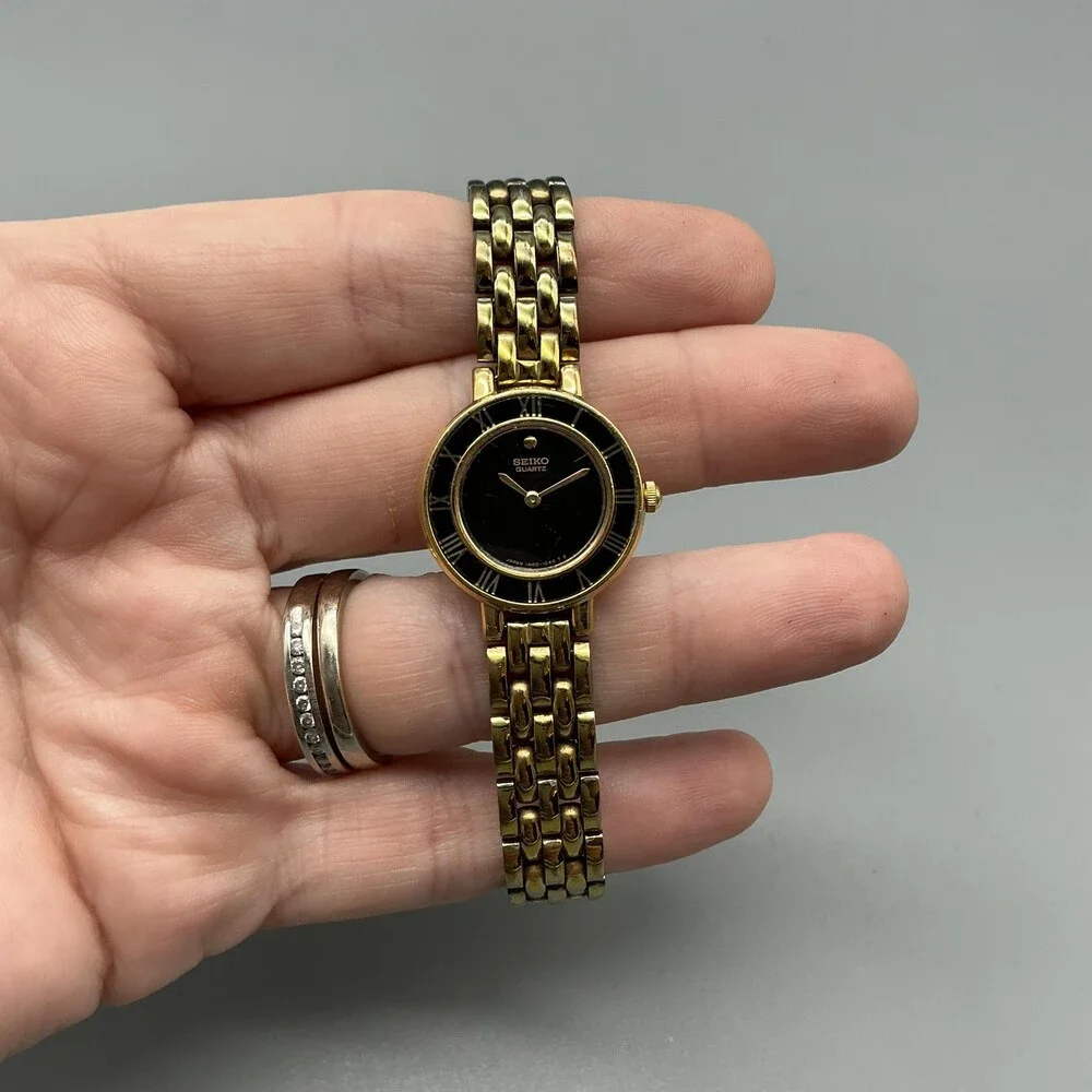 Vintage Seiko Womens Watch 21mm Black Dial Gold Tone 1N00-0D29 New Battery 6.5